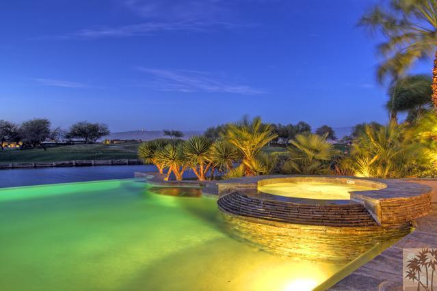384 Loch Lomond Road Rancho Mirage, CA 92270 - Photo 23 of 25 a view of a swimming pool with an outdoor space and seating area