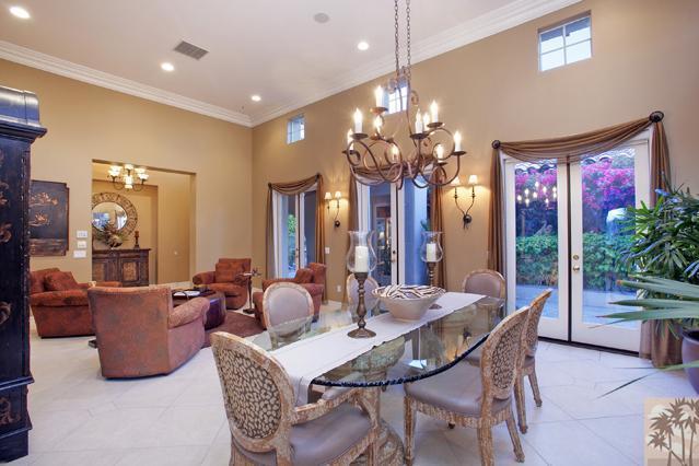 384 Loch Lomond Road Rancho Mirage, CA 92270 - Photo 8 of 25 a view of a dining room with furniture and chandelier