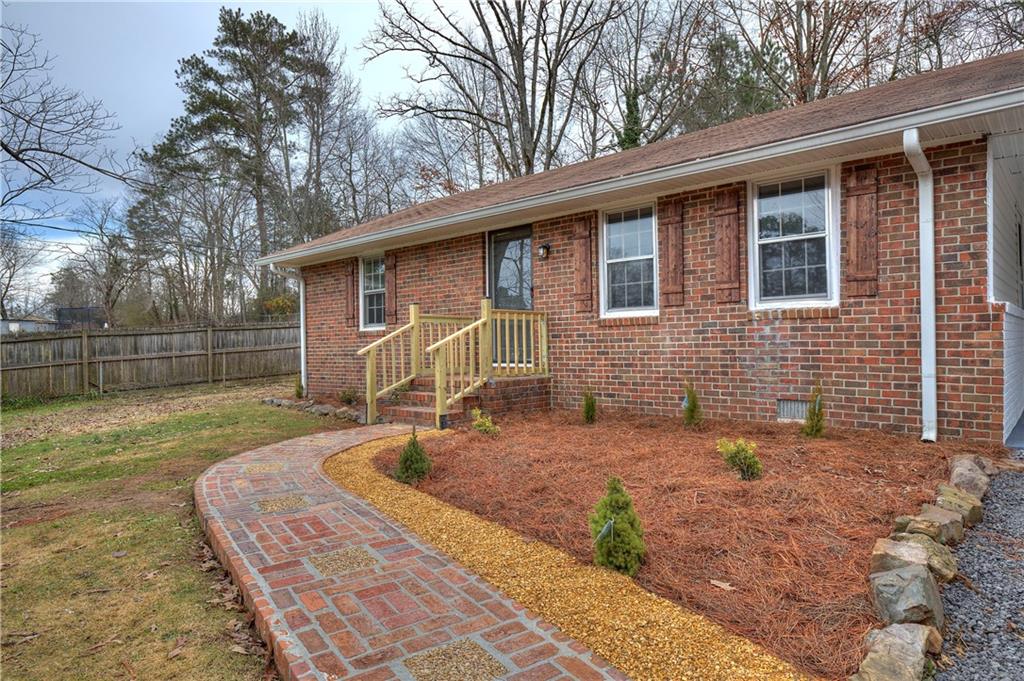 50 Lyons Drive Northwest Rome, GA 30165 - Photo 1 of 1 Look how cute this charming 4 sides brick home has turned out,
