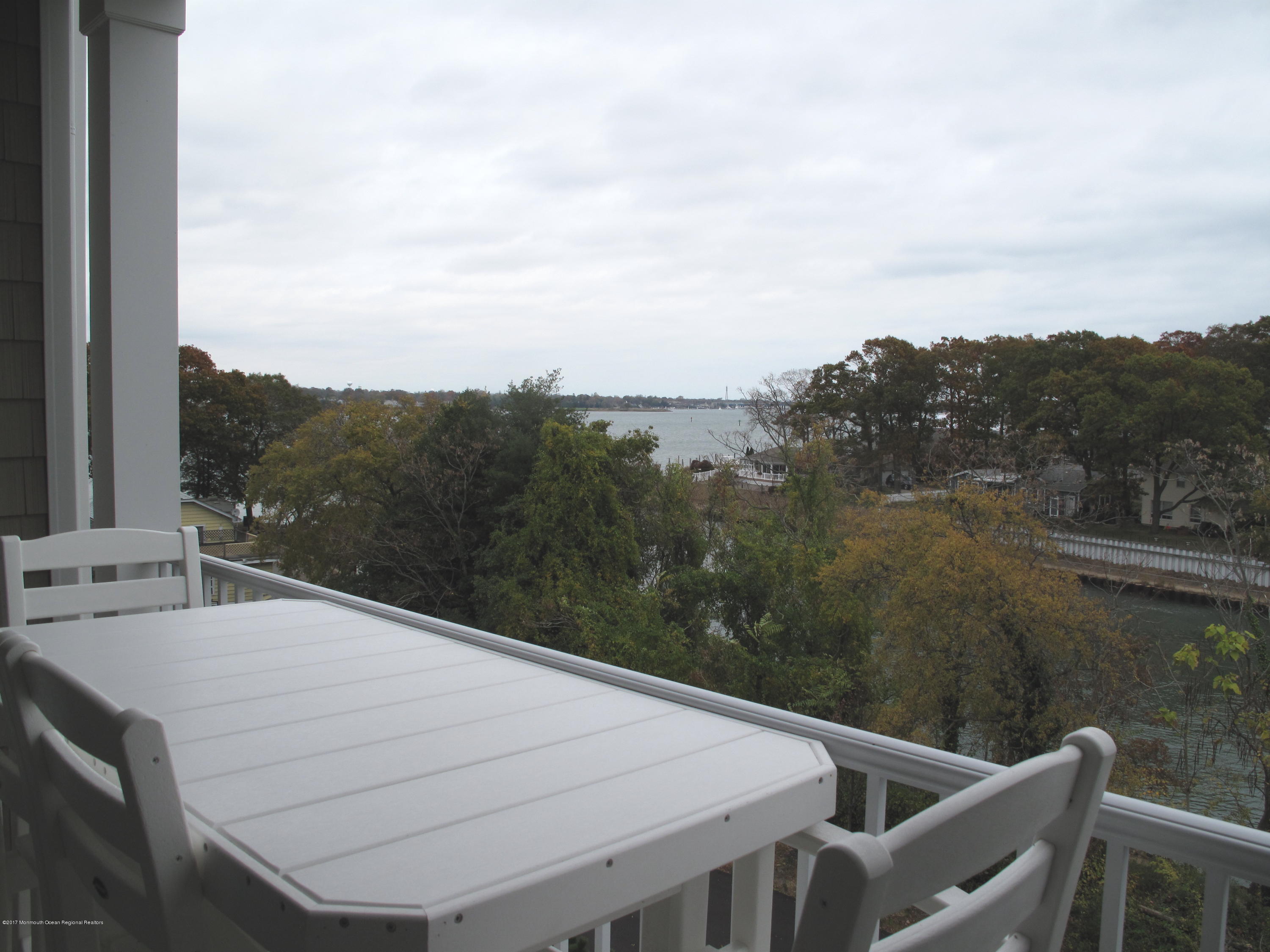 2201 River Road, Unit 4304 Point Pleasant, NJ 08742 - Photo 2 of 30 a view of balcony with furniture