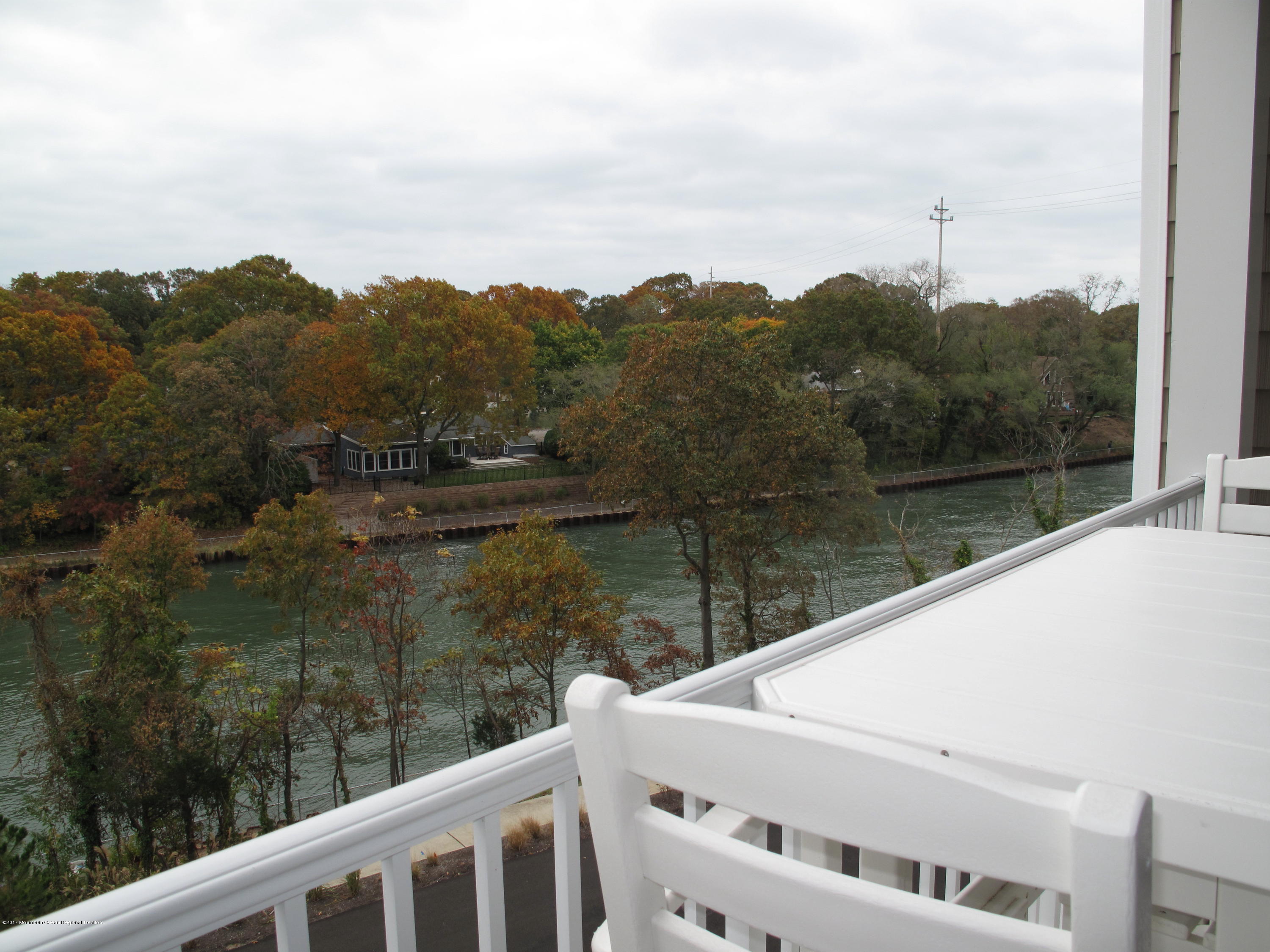 2201 River Road, Unit 4304 Point Pleasant, NJ 08742 - Photo 21 of 30 a view of a lake from a balcony
