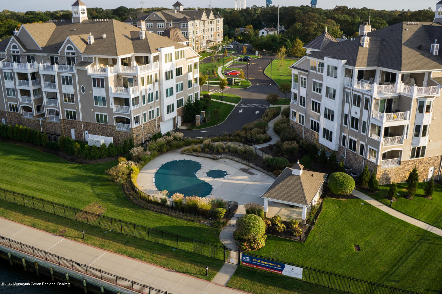 2201 River Road, Unit 4304 Point Pleasant, NJ 08742 - Photo 24 of 30 an aerial view of multiple houses with yard
