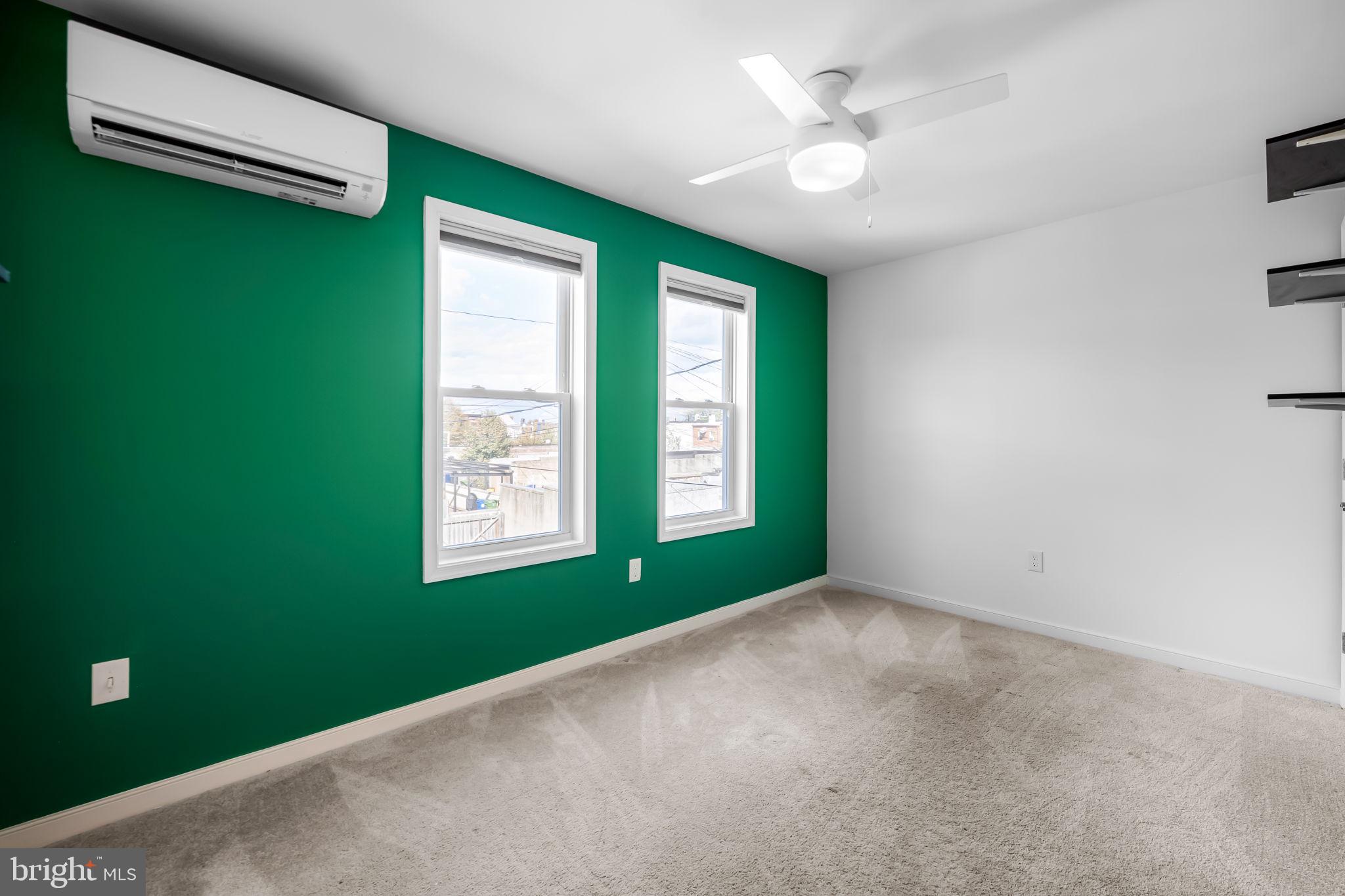 3716 Gough Street Baltimore, MD 21224 - Photo 20 of 33 a view of an empty room with window and fan