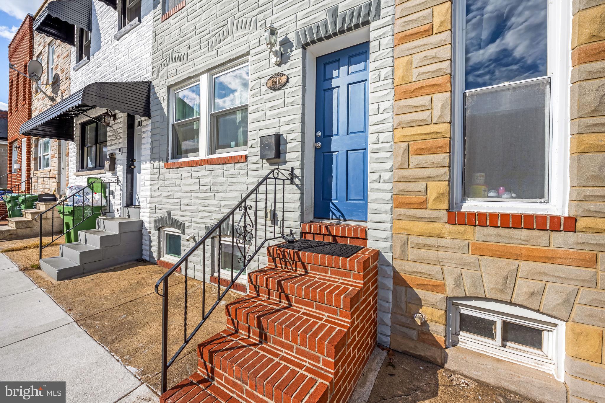 3716 Gough Street Baltimore, MD 21224 - Photo 2 of 33 a view of a brick house with many windows