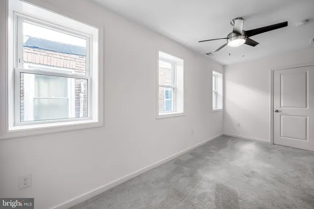 an empty room that has a window