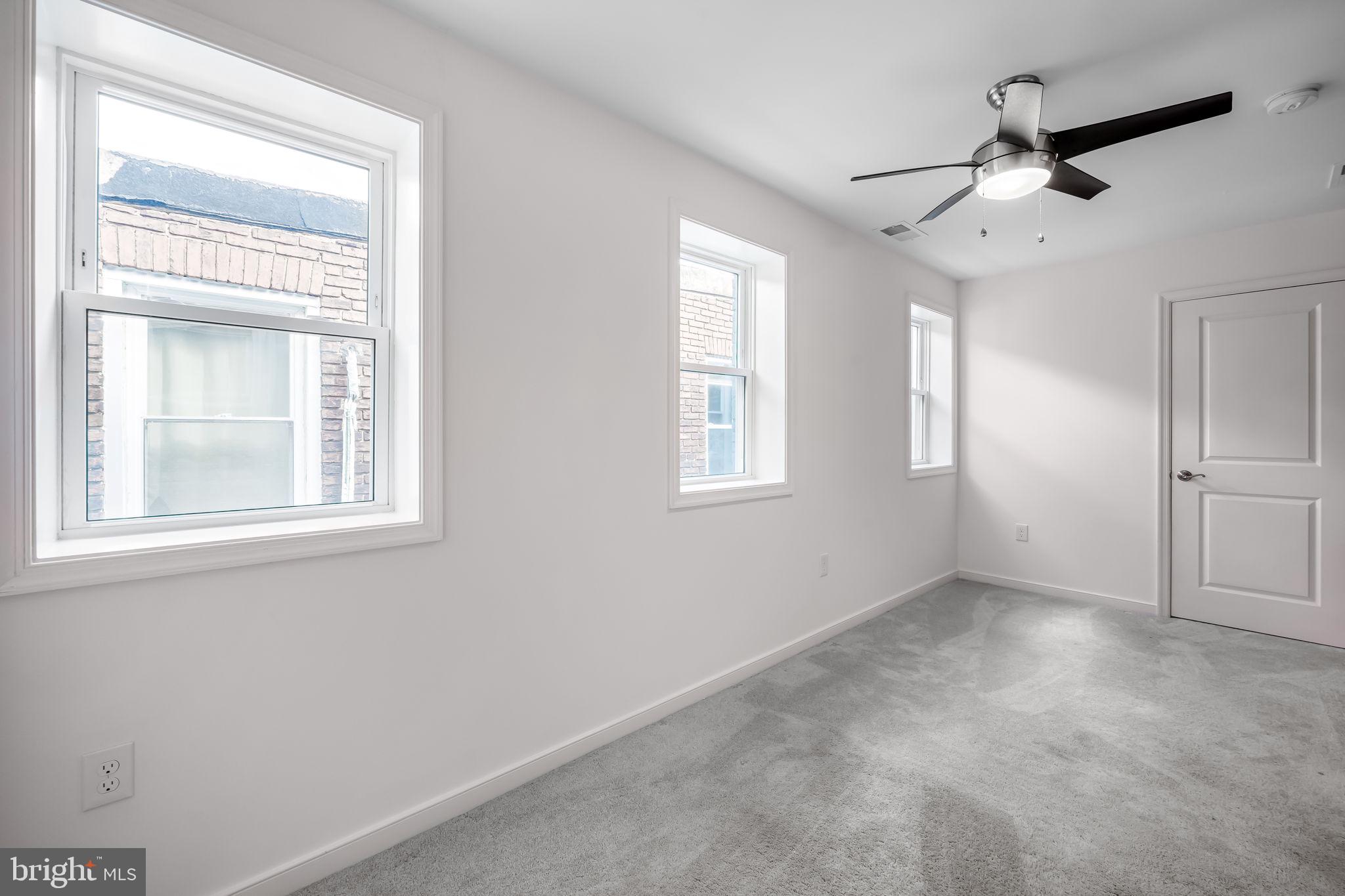 3716 Gough Street Baltimore, MD 21224 - Photo 24 of 33 an empty room that has a window
