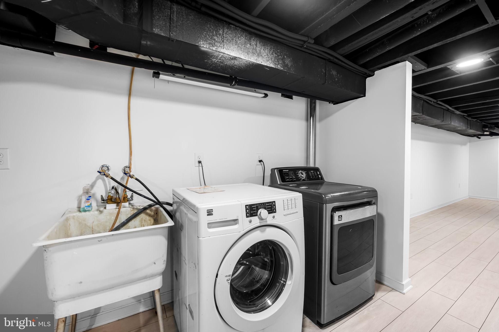 3716 Gough Street Baltimore, MD 21224 - Photo 30 of 33 a utility room with dryer and washer