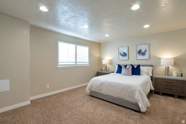 577 South Ridge Top Lane East North Salt Lake, UT 84054 - Photo 32 of 57 Comfortable guest suite with oversized layout and neutral designer finishes.