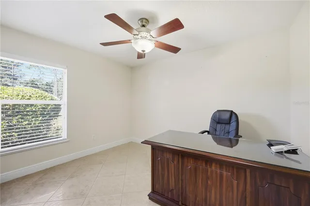 a view of a hallway with a window