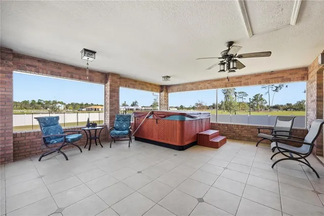 a room with furniture and a large window