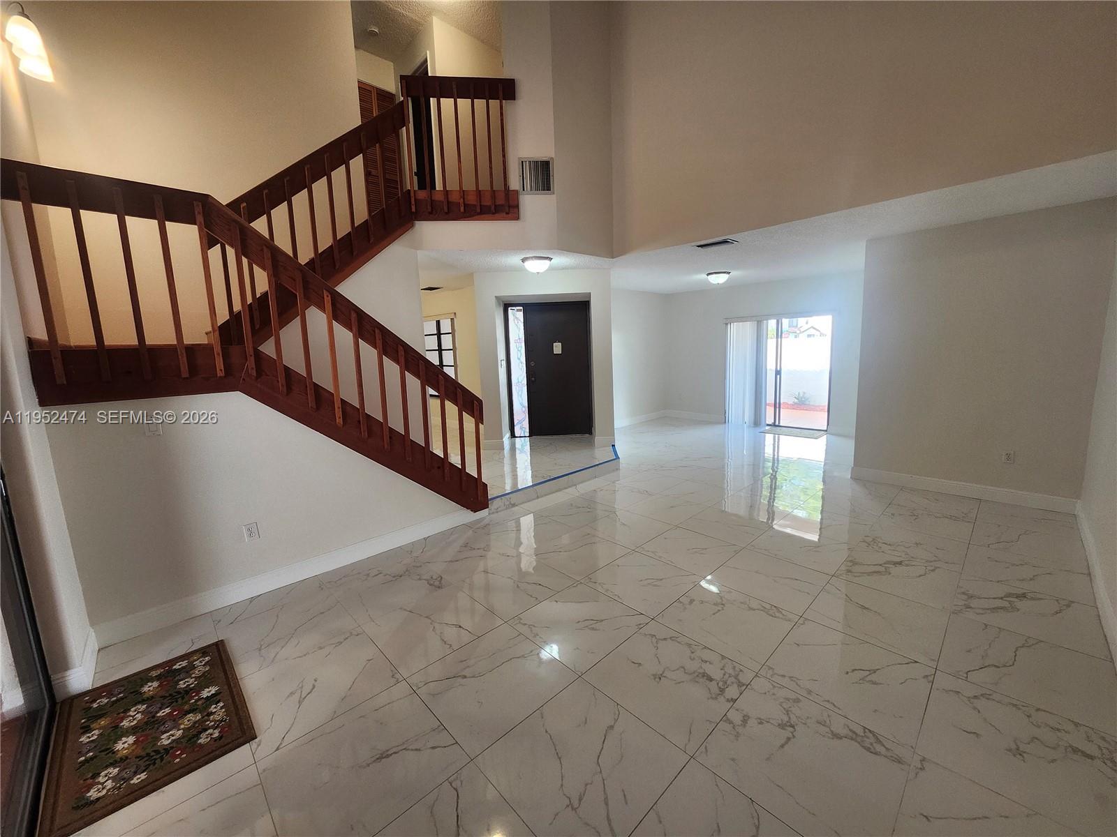 12396 Southwest 94th Lane, Unit 12396 Miami, FL 33186 - Photo 15 of 32 a view of an entryway door