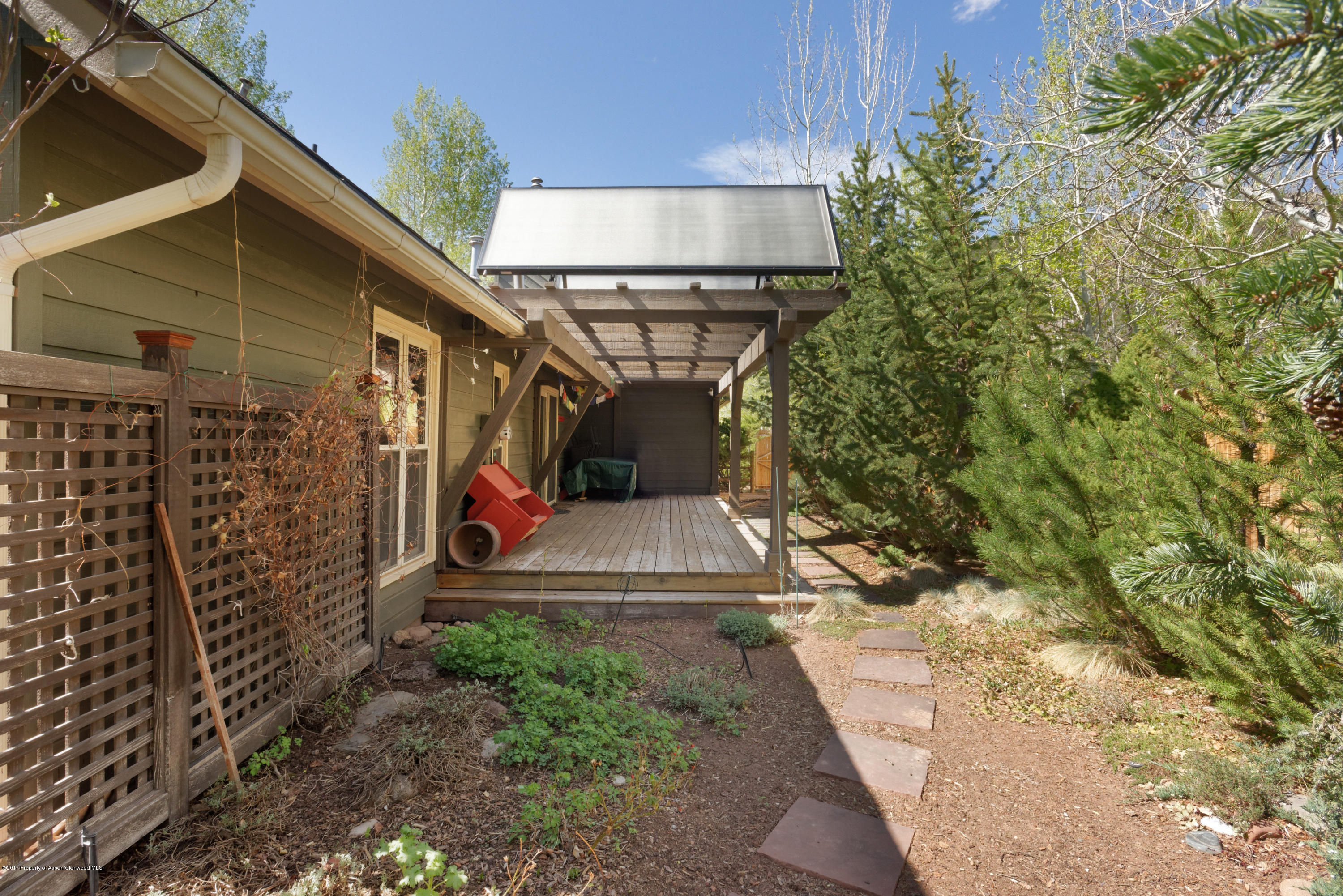 295 Riverside Drive Basalt, CO 81621 - Photo 24 of 27 a view of a house with a yard