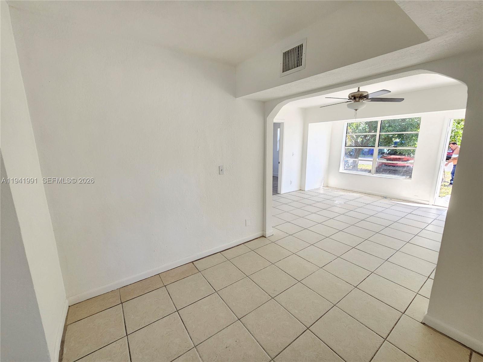 5621 Cleveland Street Hollywood, FL 33021 - Photo 13 of 19 a view of an empty room and window