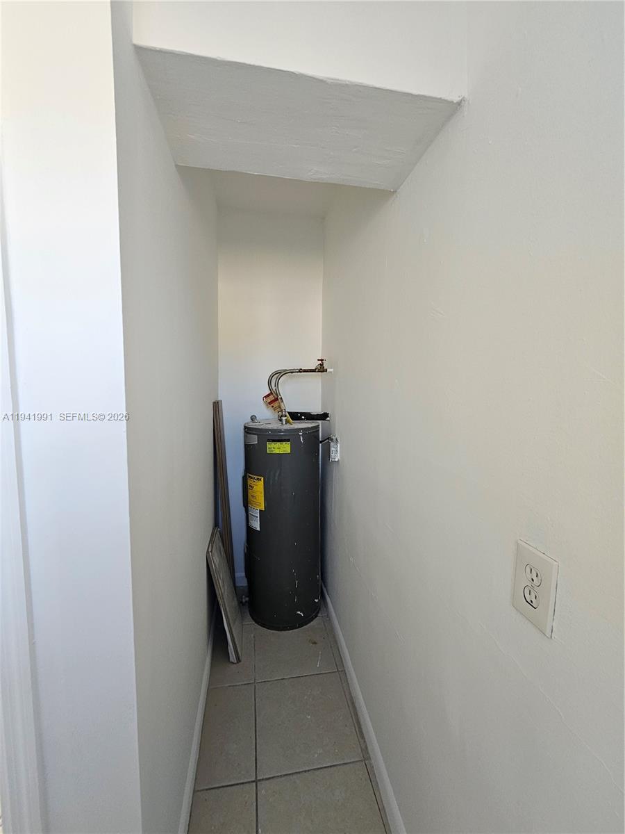 5621 Cleveland Street Hollywood, FL 33021 - Photo 19 of 19 a view of storage and utility room