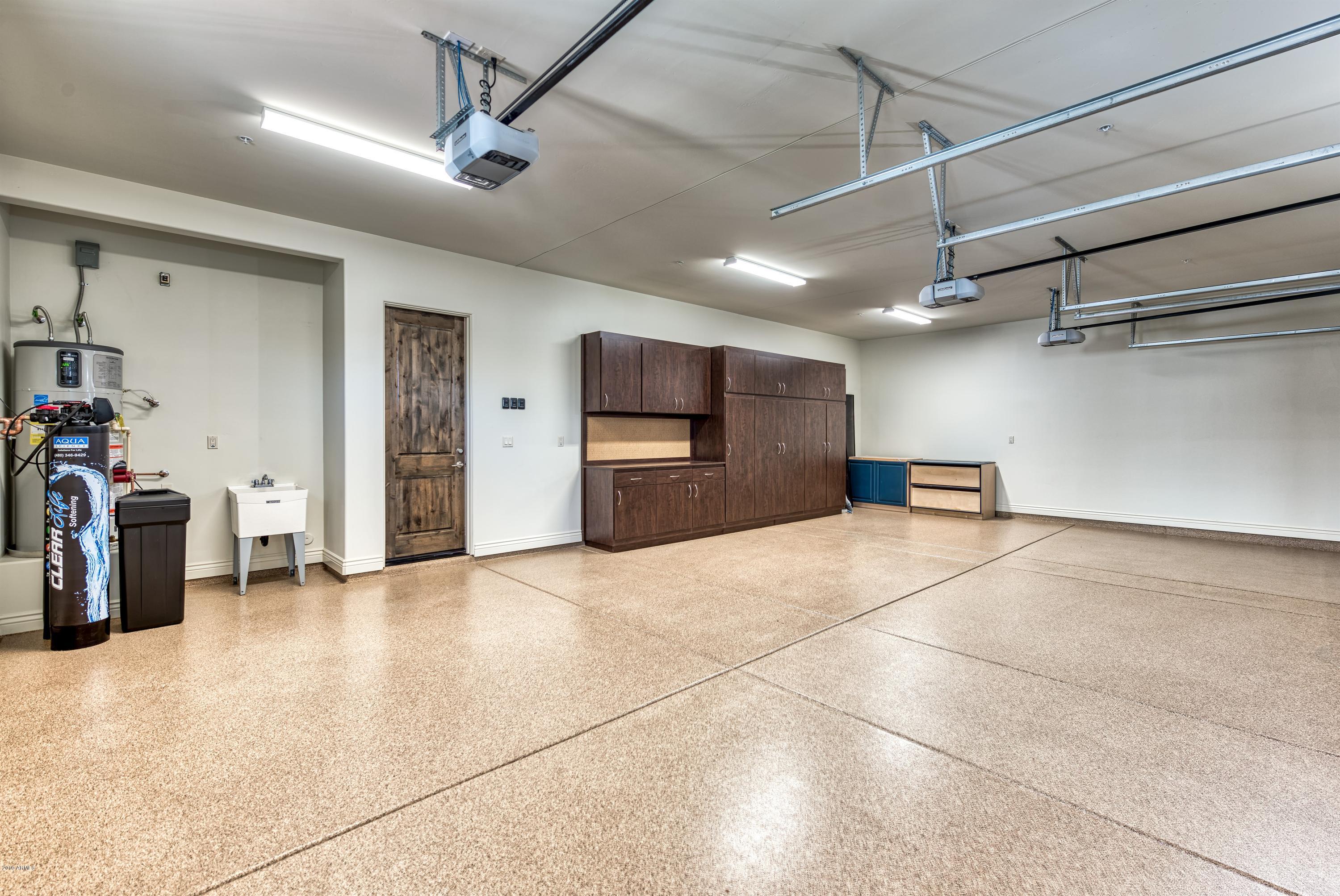 19004 East Picacho Road Rio Verde, AZ 85263 - Photo 30 of 36 028_Three Car Garage~Epoxy Floor
