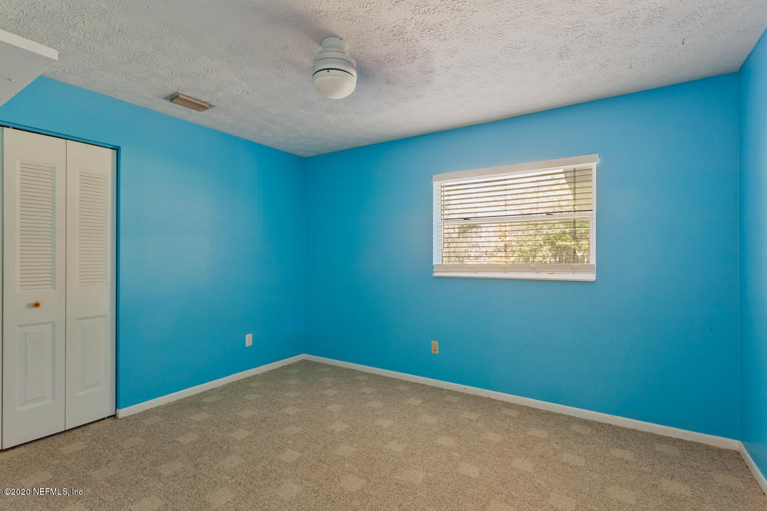 6576 Immokalee Road Keystone Heights, FL 32656 - Photo 15 of 31 an empty room with a window