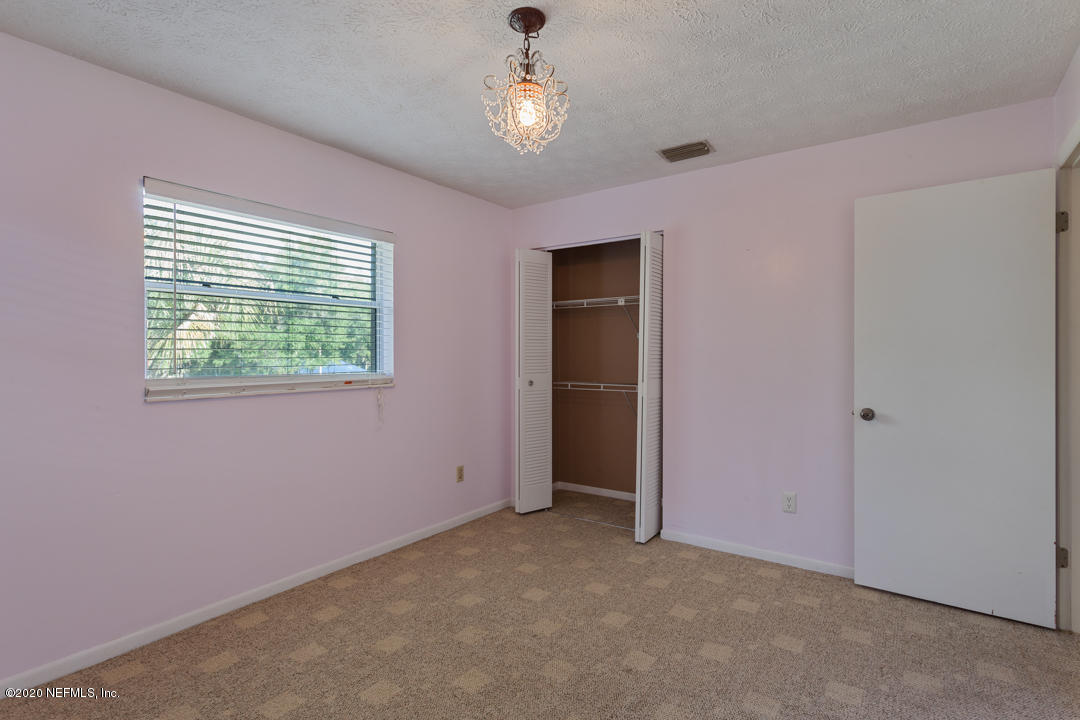 6576 Immokalee Road Keystone Heights, FL 32656 - Photo 16 of 31 a view of an empty room with a window