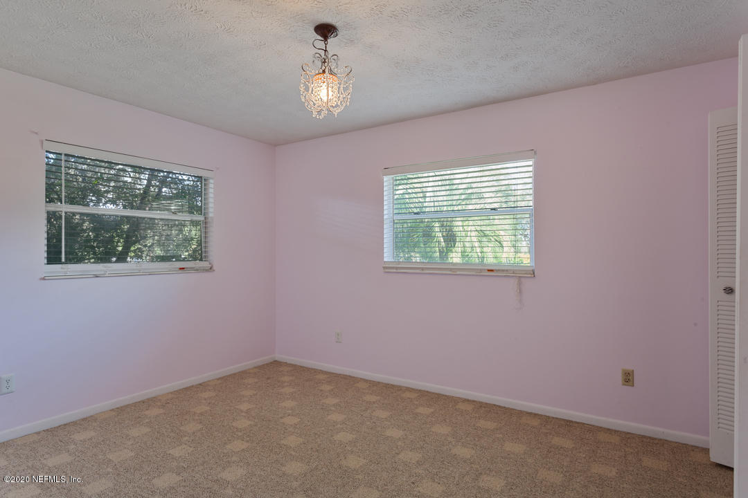 6576 Immokalee Road Keystone Heights, FL 32656 - Photo 17 of 31 an empty room with a window