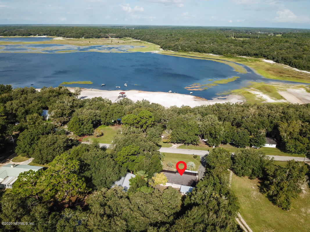 6576 Immokalee Road Keystone Heights, FL 32656 - Photo 2 of 31 a view of an ocean and a mountain