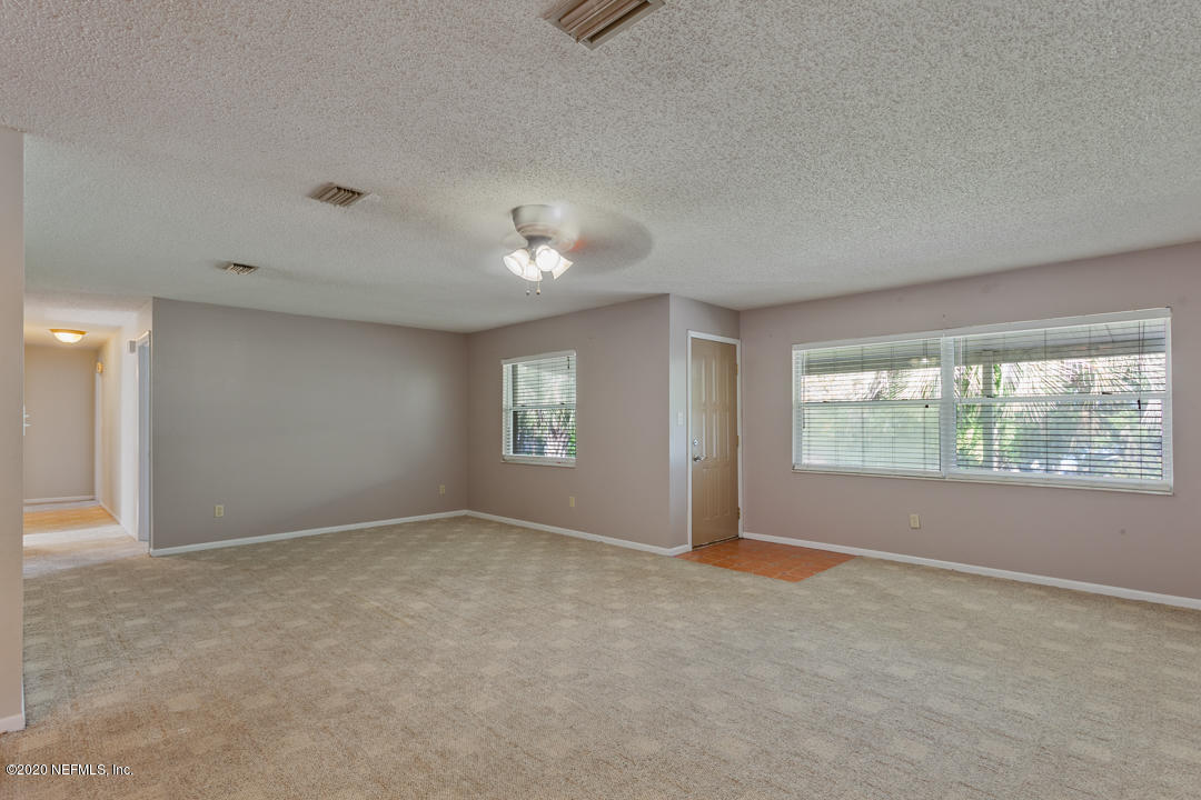 6576 Immokalee Road Keystone Heights, FL 32656 - Photo 25 of 31 an empty room with windows