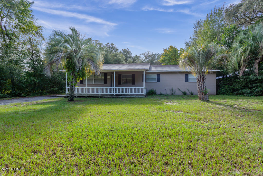 6576 Immokalee Road Keystone Heights, FL 32656 - Photo 29 of 31 front view of a house with a yard