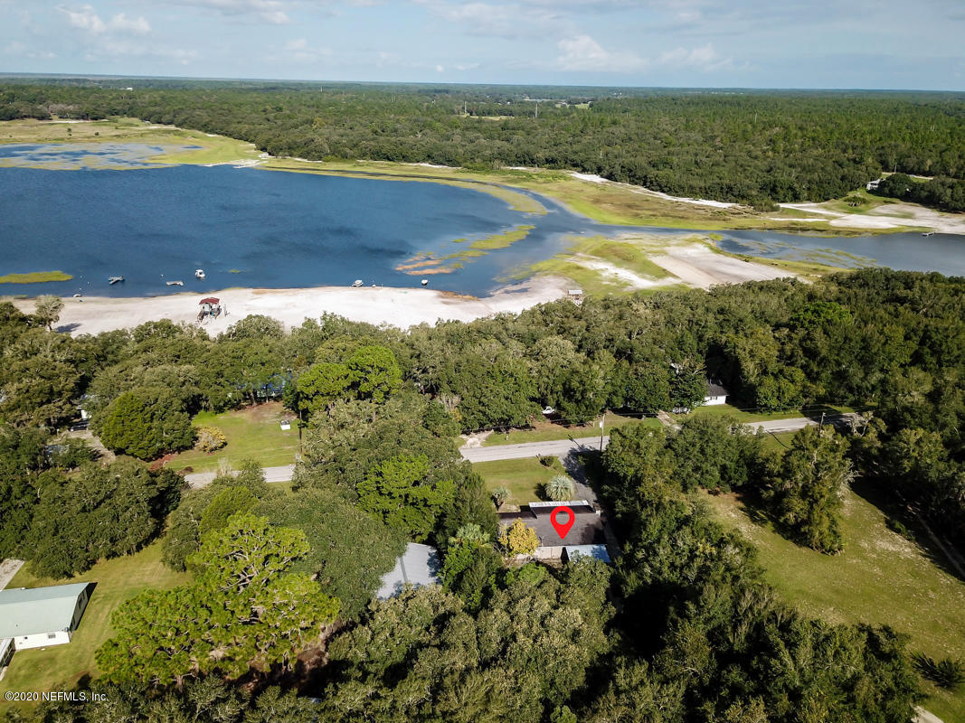 6576 Immokalee Road Keystone Heights, FL 32656 - Photo 3 of 31 a view of an ocean and a mountain