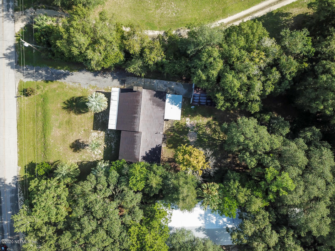 6576 Immokalee Road Keystone Heights, FL 32656 - Photo 5 of 31 an aerial view of a house with a yard
