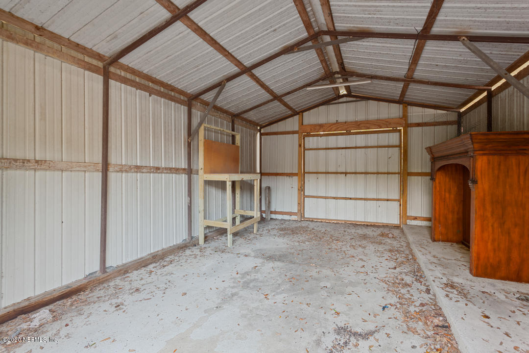 6576 Immokalee Road Keystone Heights, FL 32656 - Photo 9 of 31 a view of storage and utility room