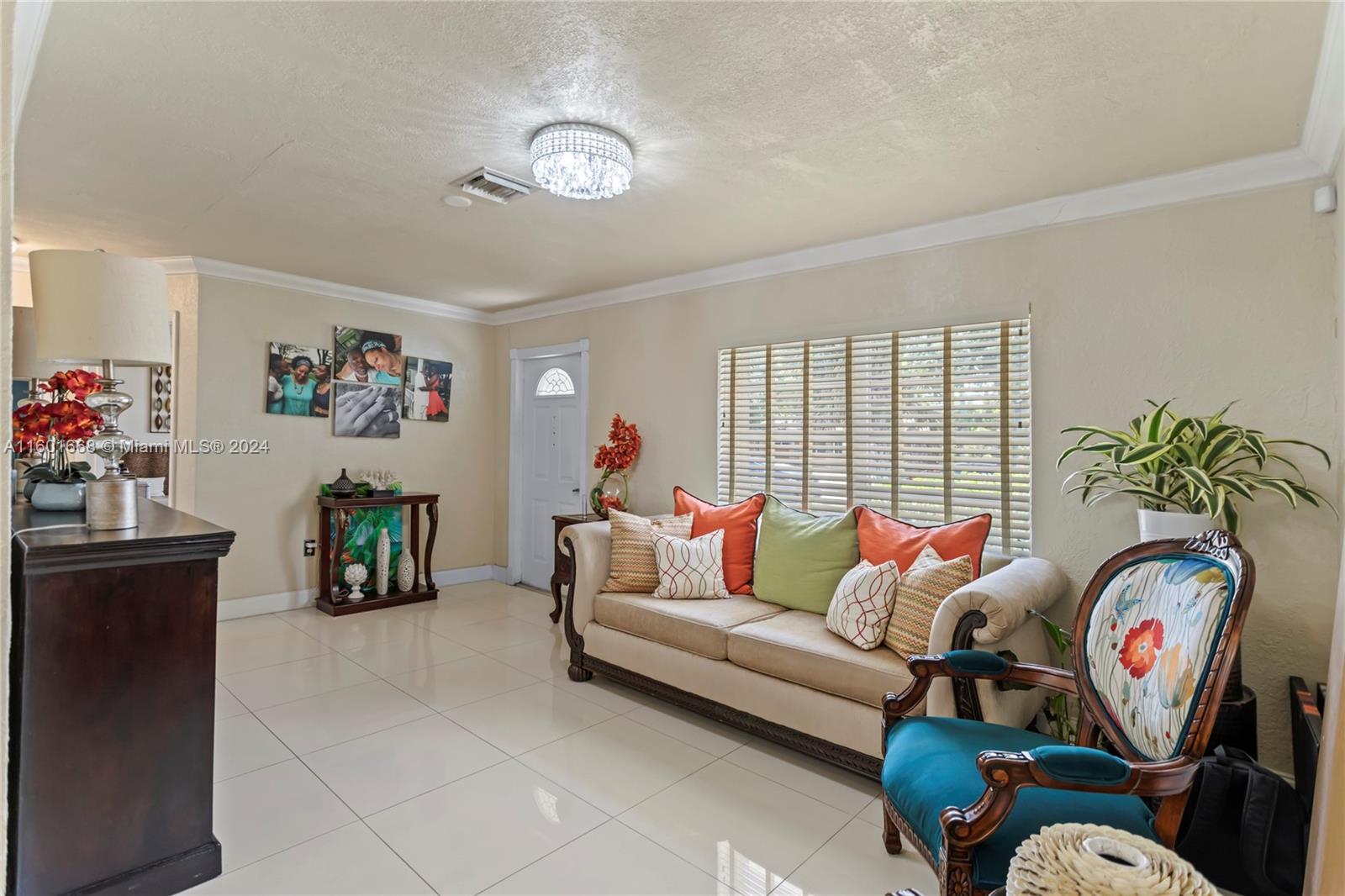2919 Southwest 68th Avenue Miramar, FL 33023 - Photo 11 of 46 a living room with furniture and a large window
