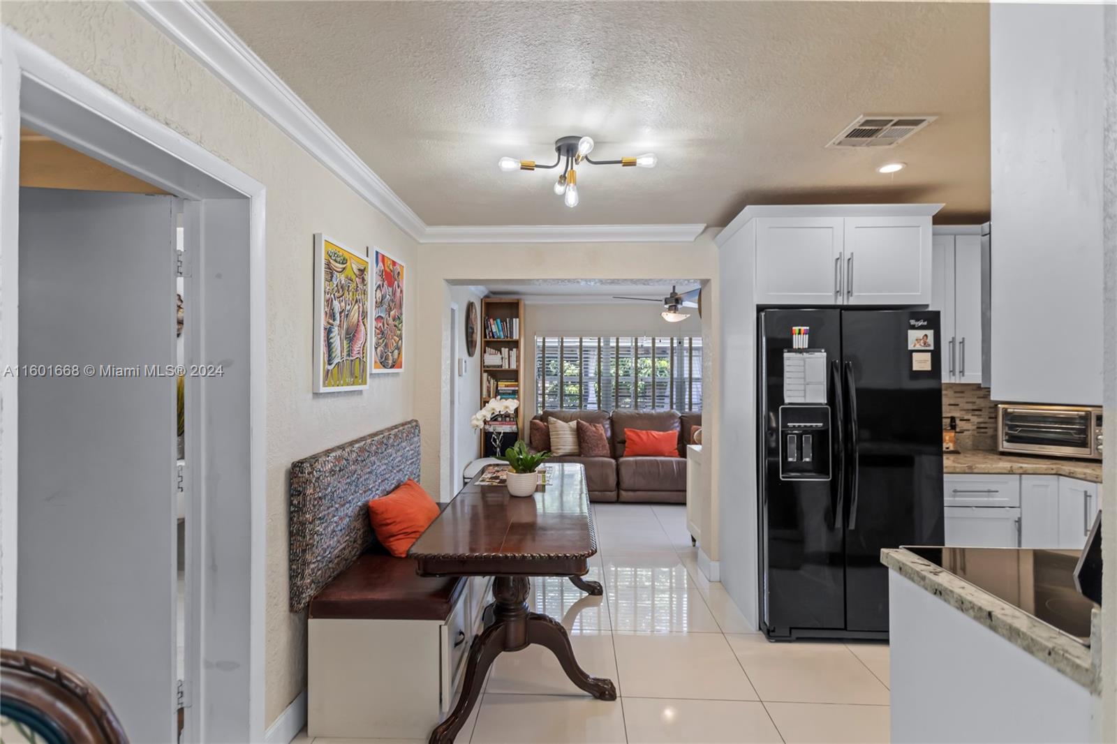 2919 Southwest 68th Avenue Miramar, FL 33023 - Photo 12 of 46 a lobby with furniture and chandelier