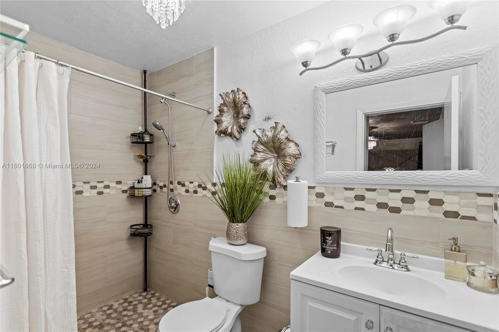 2919 Southwest 68th Avenue Miramar, FL 33023 - Photo 21 of 46 a bathroom with a sink toilet and shower