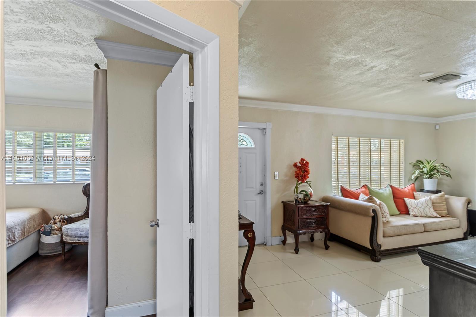 2919 Southwest 68th Avenue Miramar, FL 33023 - Photo 26 of 46 a living room with furniture and a window