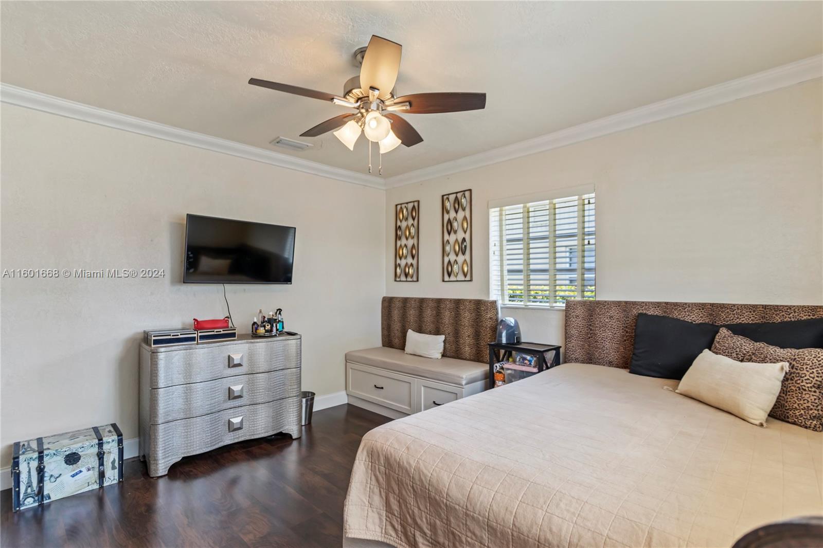 2919 Southwest 68th Avenue Miramar, FL 33023 - Photo 29 of 46 a bedroom with two beds and a flat screen tv