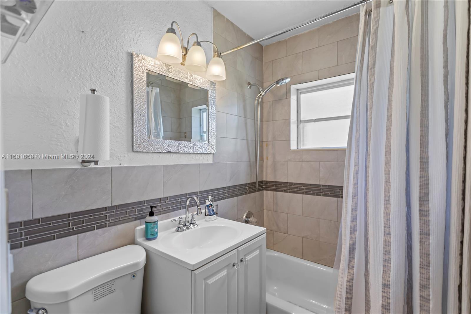 2919 Southwest 68th Avenue Miramar, FL 33023 - Photo 30 of 46 a bathroom with a sink toilet and shower