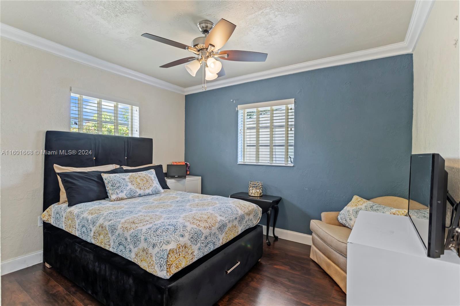 2919 Southwest 68th Avenue Miramar, FL 33023 - Photo 32 of 46 a bedroom with a bed and window