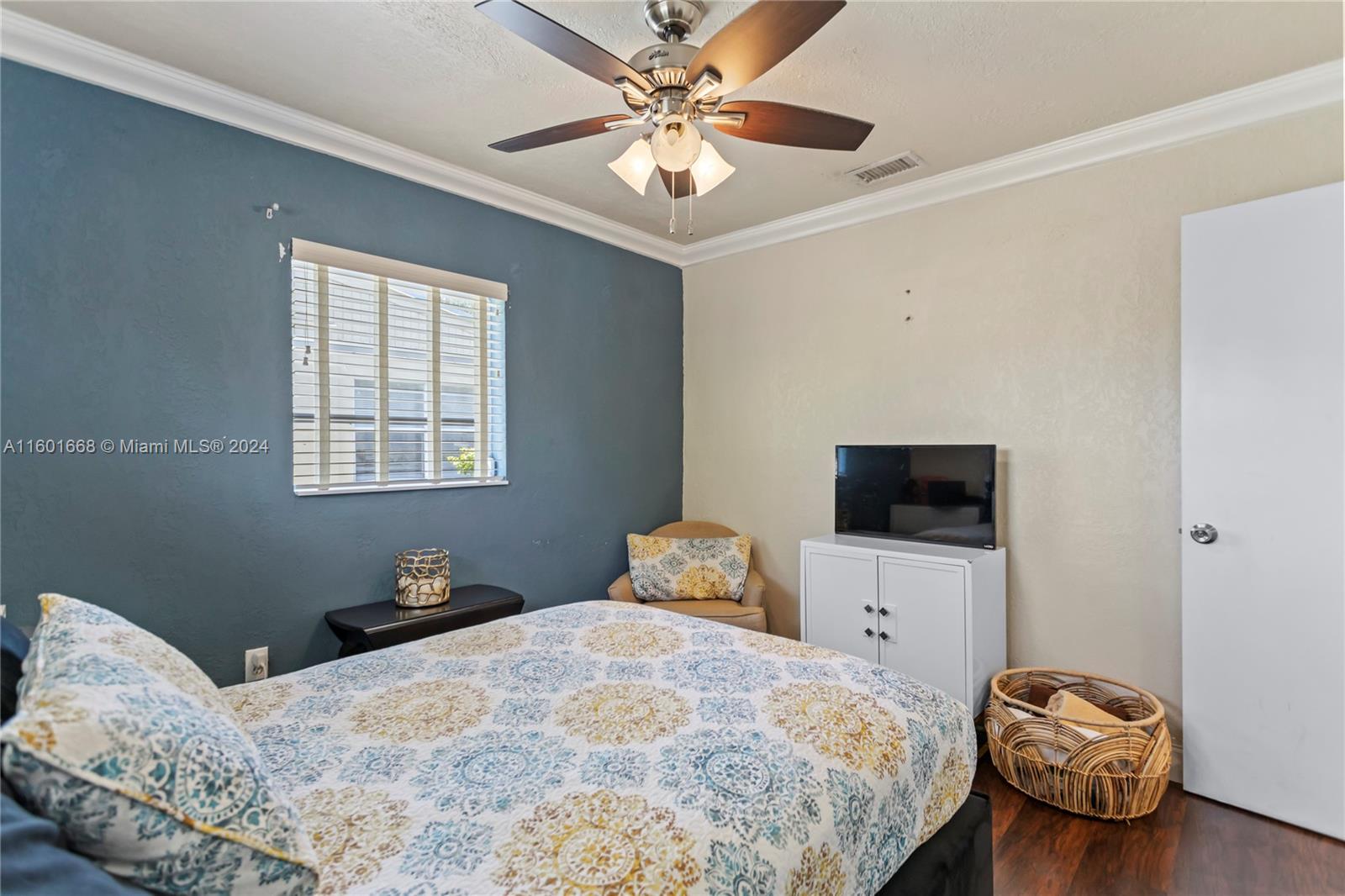 2919 Southwest 68th Avenue Miramar, FL 33023 - Photo 33 of 46 a bedroom with a bed and a tv