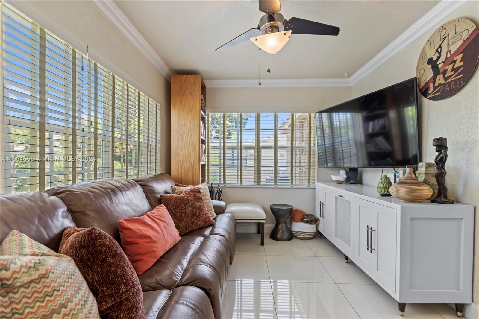 2919 Southwest 68th Avenue Miramar, FL 33023 - Photo 36 of 46 a living room with furniture and a large window