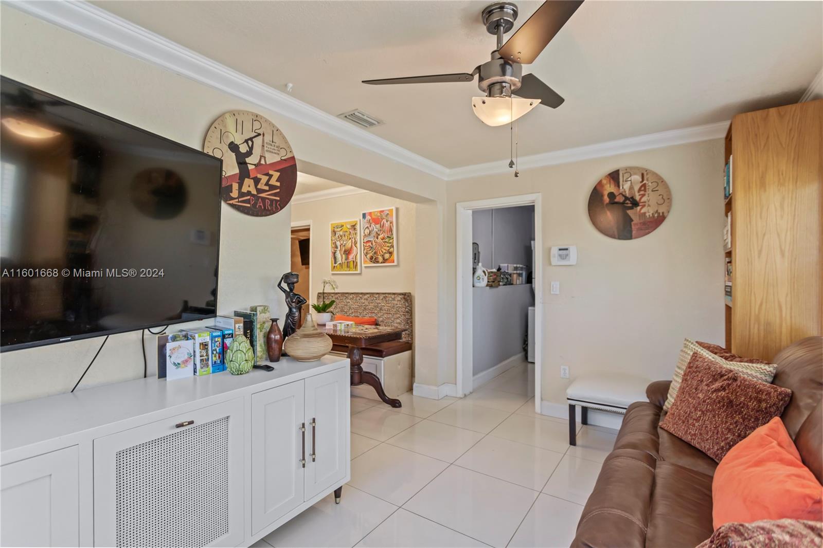 2919 Southwest 68th Avenue Miramar, FL 33023 - Photo 37 of 46 a view of living room with furniture and a flat screen tv