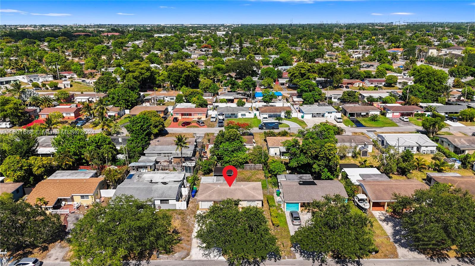2919 Southwest 68th Avenue Miramar, FL 33023 - Photo 4 of 46 an aerial view of residential houses with outdoor space and trees