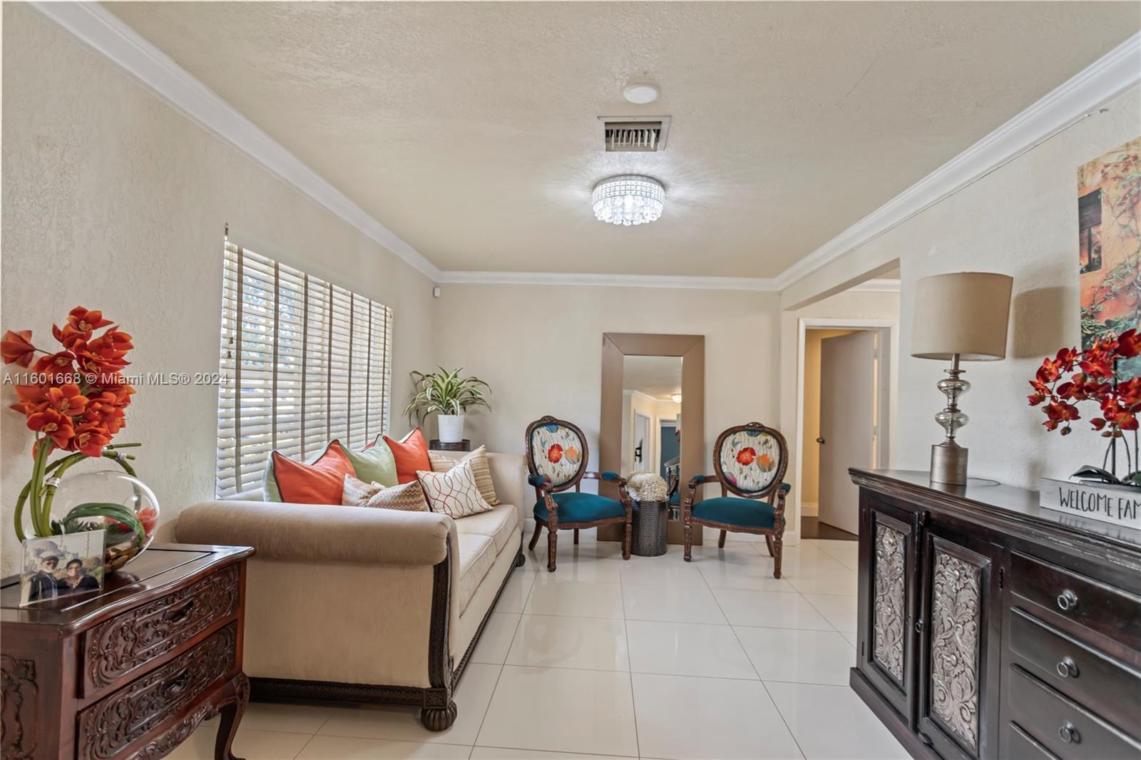 2919 Southwest 68th Avenue Miramar, FL 33023 - Photo 10 of 46 a living room with furniture and a window