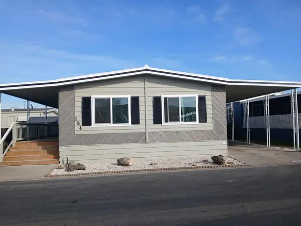a front view of a house with a garage