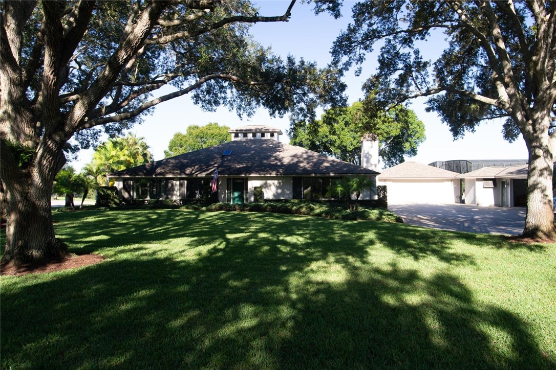 869 Robin Lane Sebastian, FL 32958 - Photo 1 of 1 a view of a house with a yard