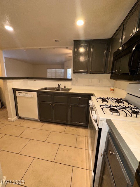 1830 North Pecos Road, Unit 155 Las Vegas, NV 89115 - Photo 12 of 23 Kitchen featuring range, dishwashing machine, a sink, light countertops, and recessed lighting