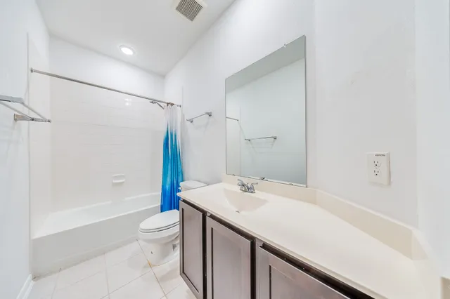 a view of hallway with windows