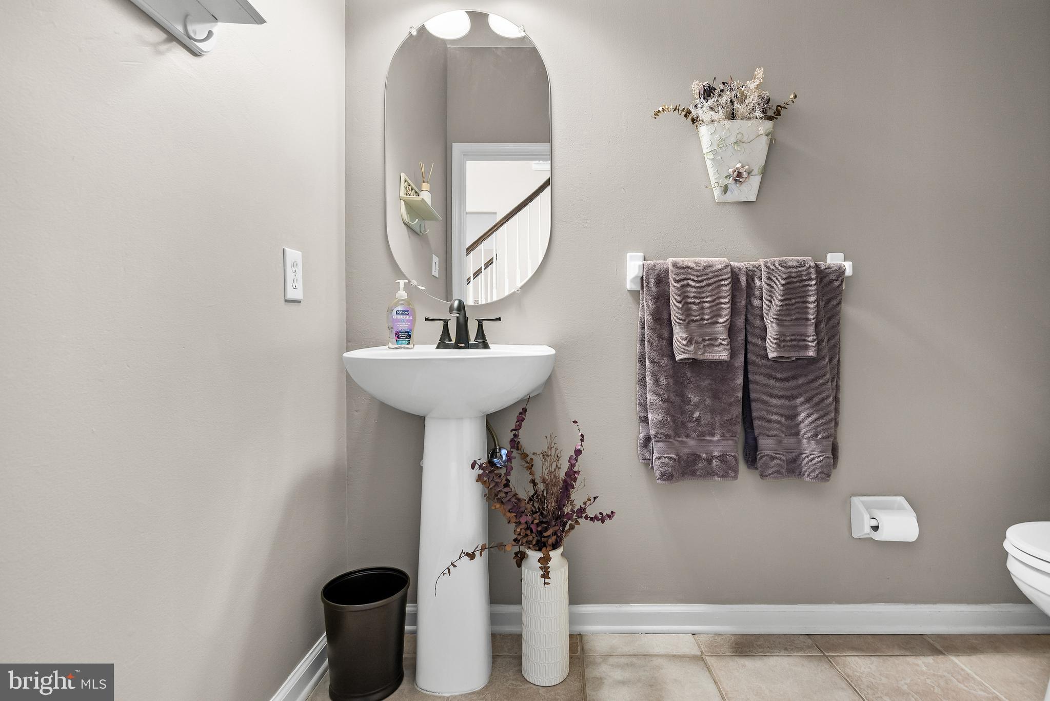 52 Flemish Way Lumberton, NJ 08048 - Photo 17 of 36 a bathroom with a sink and mirror