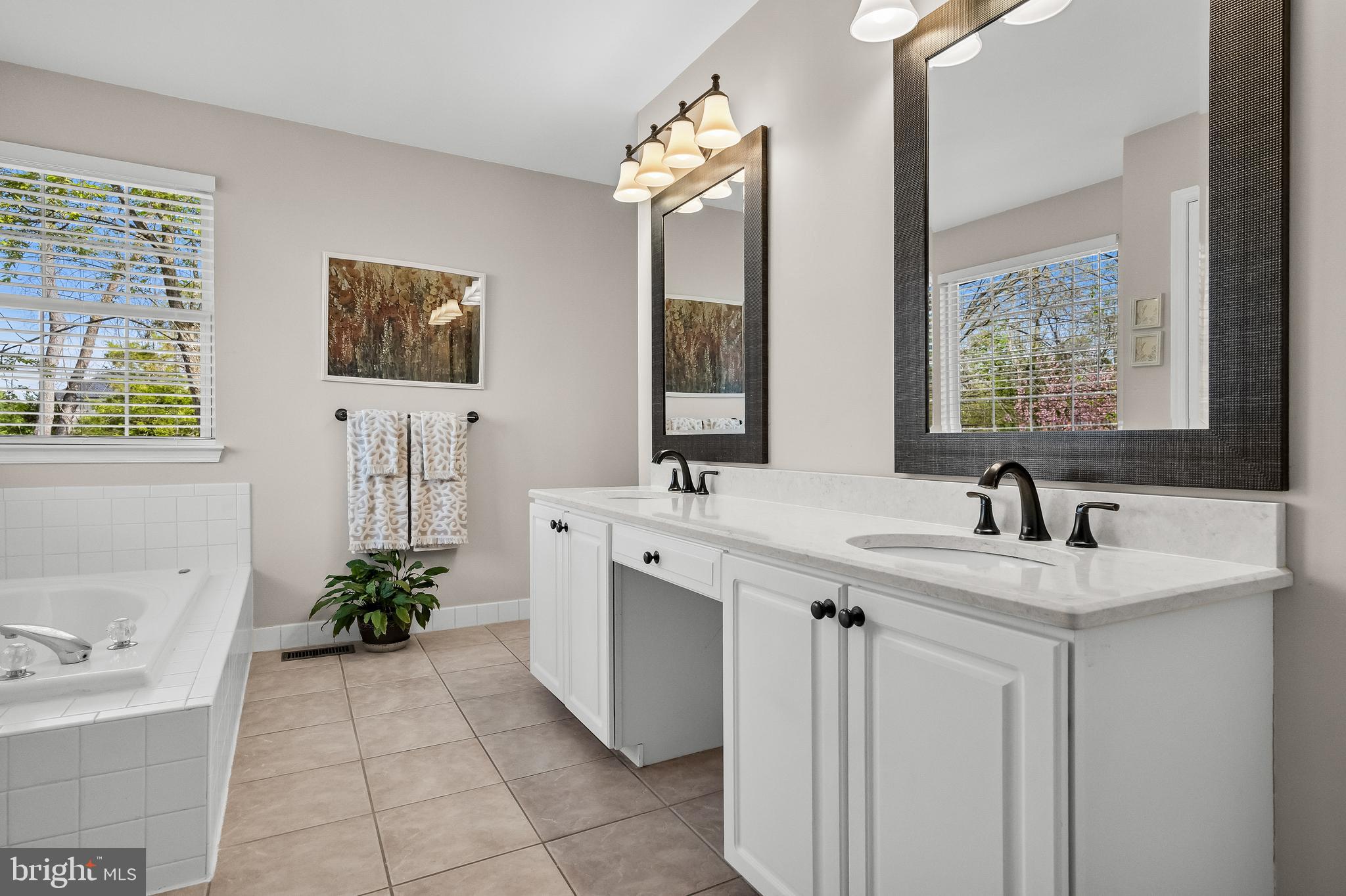 52 Flemish Way Lumberton, NJ 08048 - Photo 24 of 36 a spacious bathroom with a sink and a mirror