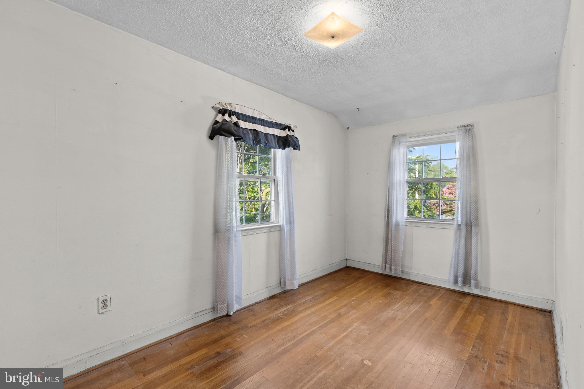 1957 Quentin Road Baltimore, MD 21222 - Photo 18 of 33 Bedroom Two with Hardwood Floors