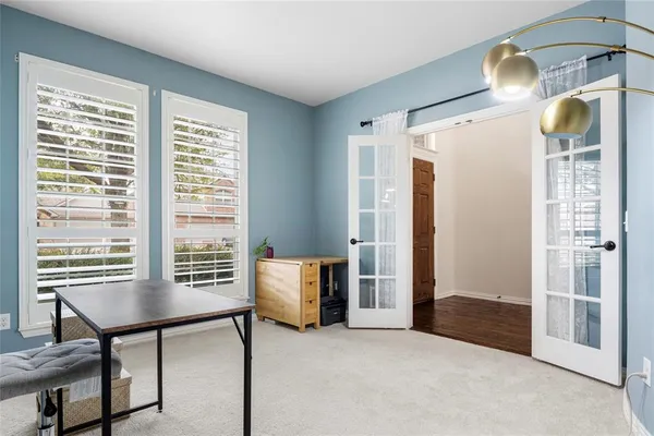a view of livingroom with furniture and window