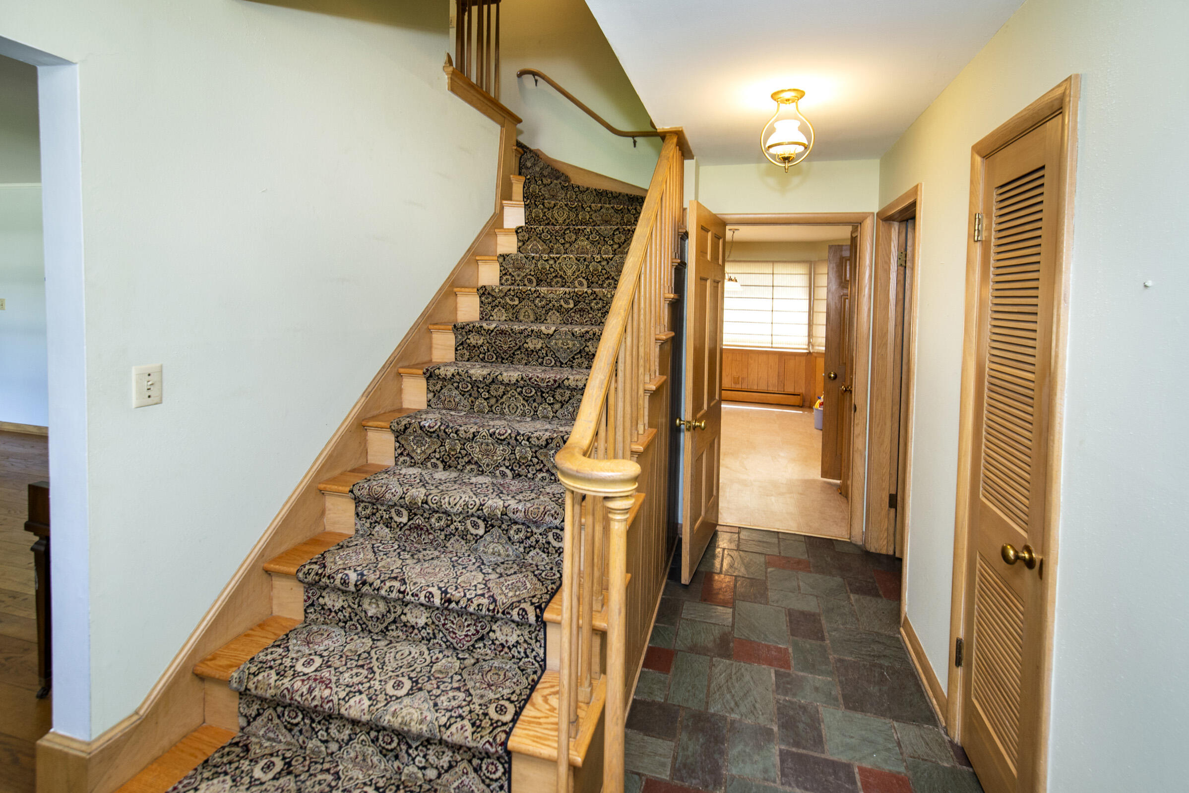 127 East Fox Dale Road Glendale, WI 53217 - Photo 29 of 79 Staircase to Upper Level
