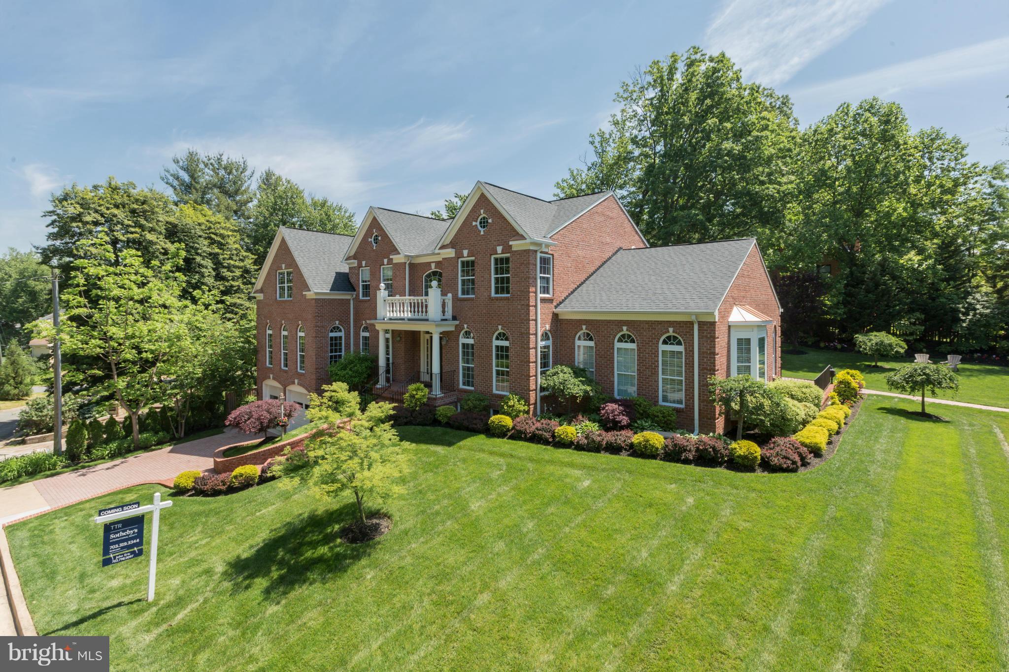 4019 Lorcom Lane Arlington, VA 22207 - Photo 1 of 1 a front view of a house with garden